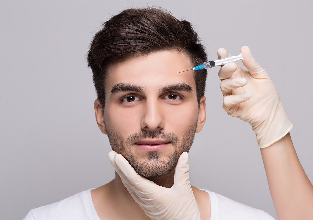Erase forehead lines and restore masculine contours with dermal fillers for men